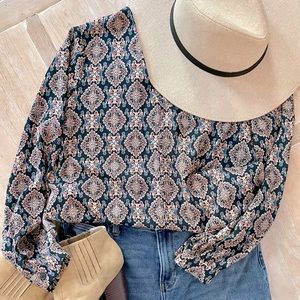 Long sleeve , v neck blouse
